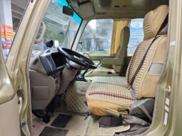 
										Toyota Coaster, a medium-sized bus full									