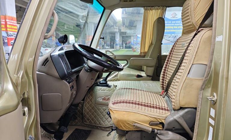 
								Toyota Coaster, a medium-sized bus full									